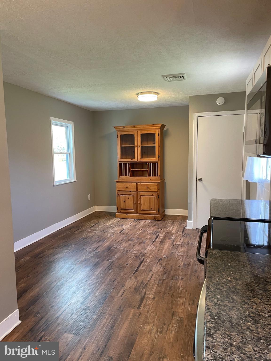 5 Oak Street Cambridge, MD 21613 - Photo 15 of 31 a view of a livingroom with furniture and a window