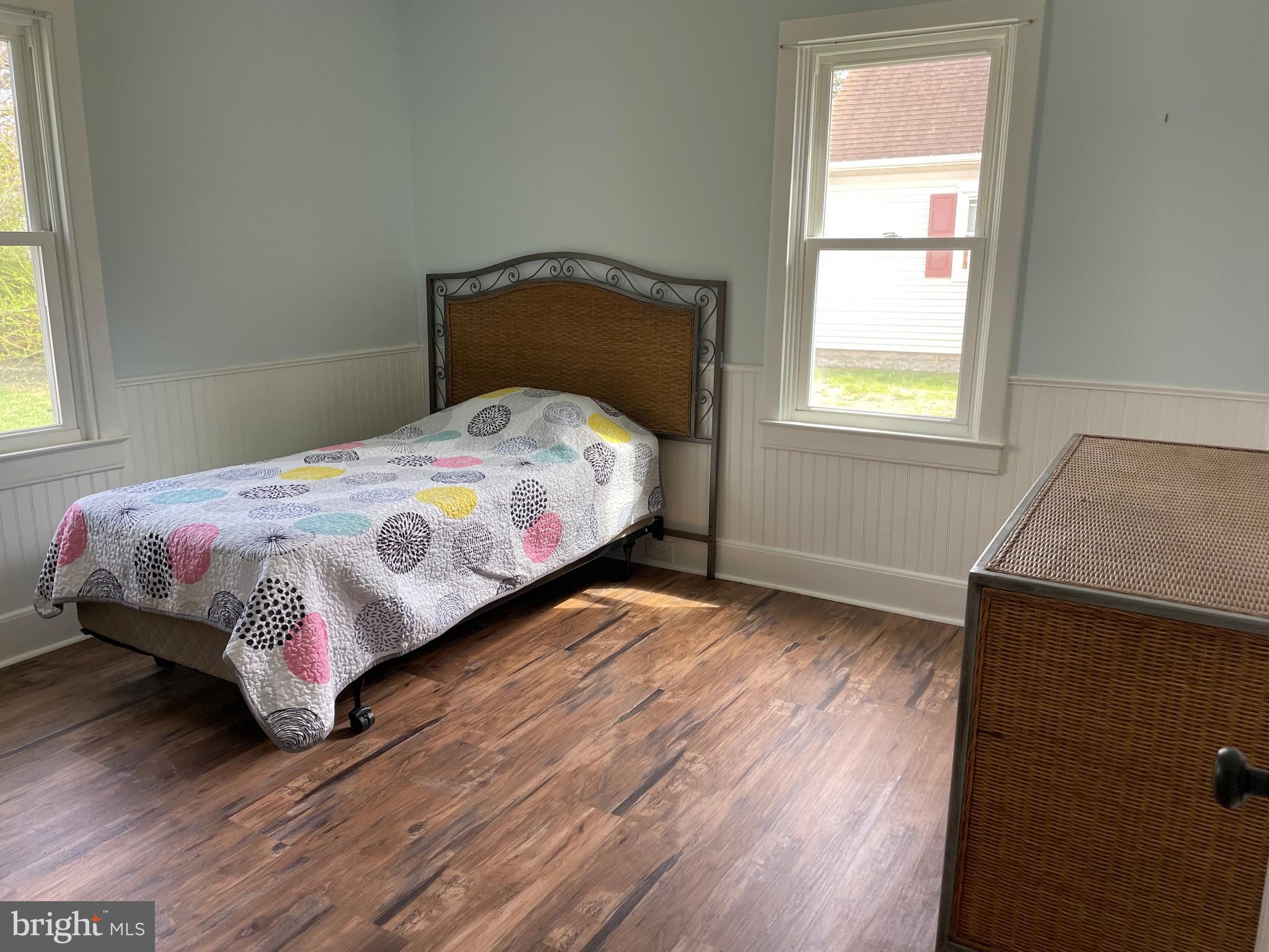 5 Oak Street Cambridge, MD 21613 - Photo 25 of 31 a bedroom with a bed and a window