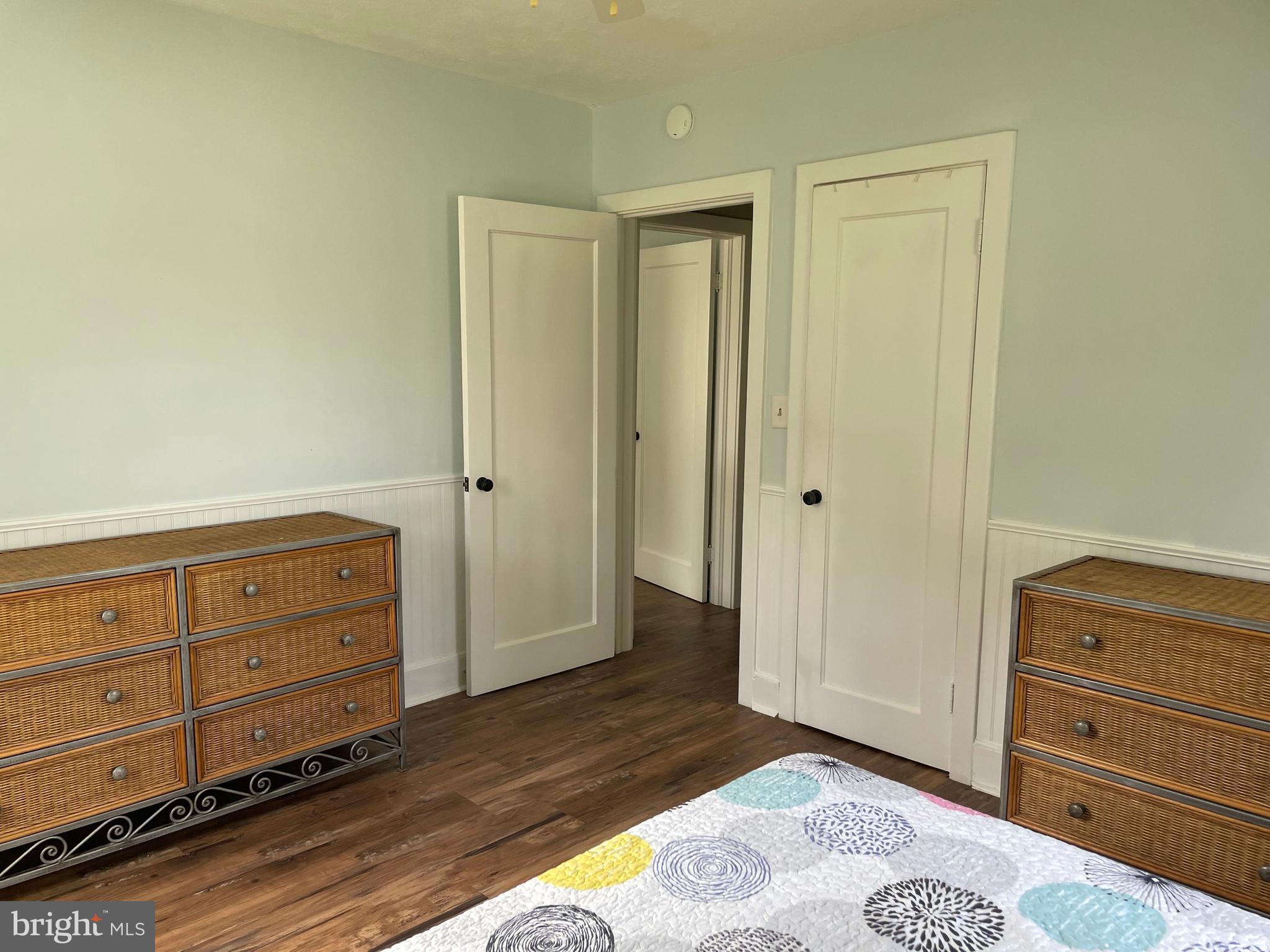 5 Oak Street Cambridge, MD 21613 - Photo 3 of 31 a view of a dresser with wooden floor
