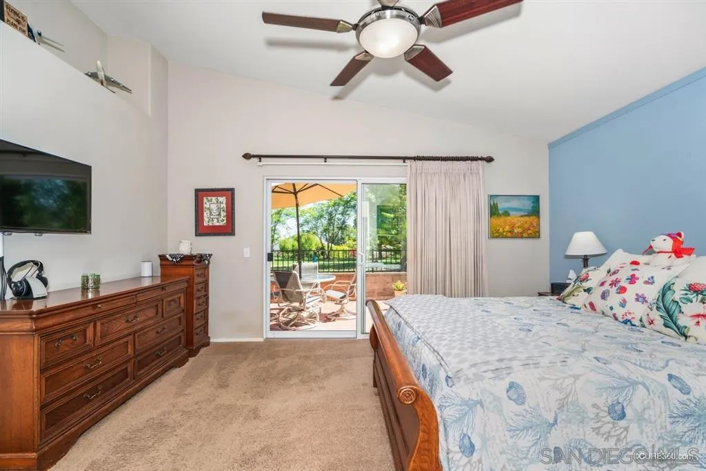 2332 Columbine Road Alpine, CA 91901 - Photo 11 of 25 a bedroom with a bed and flat screen tv