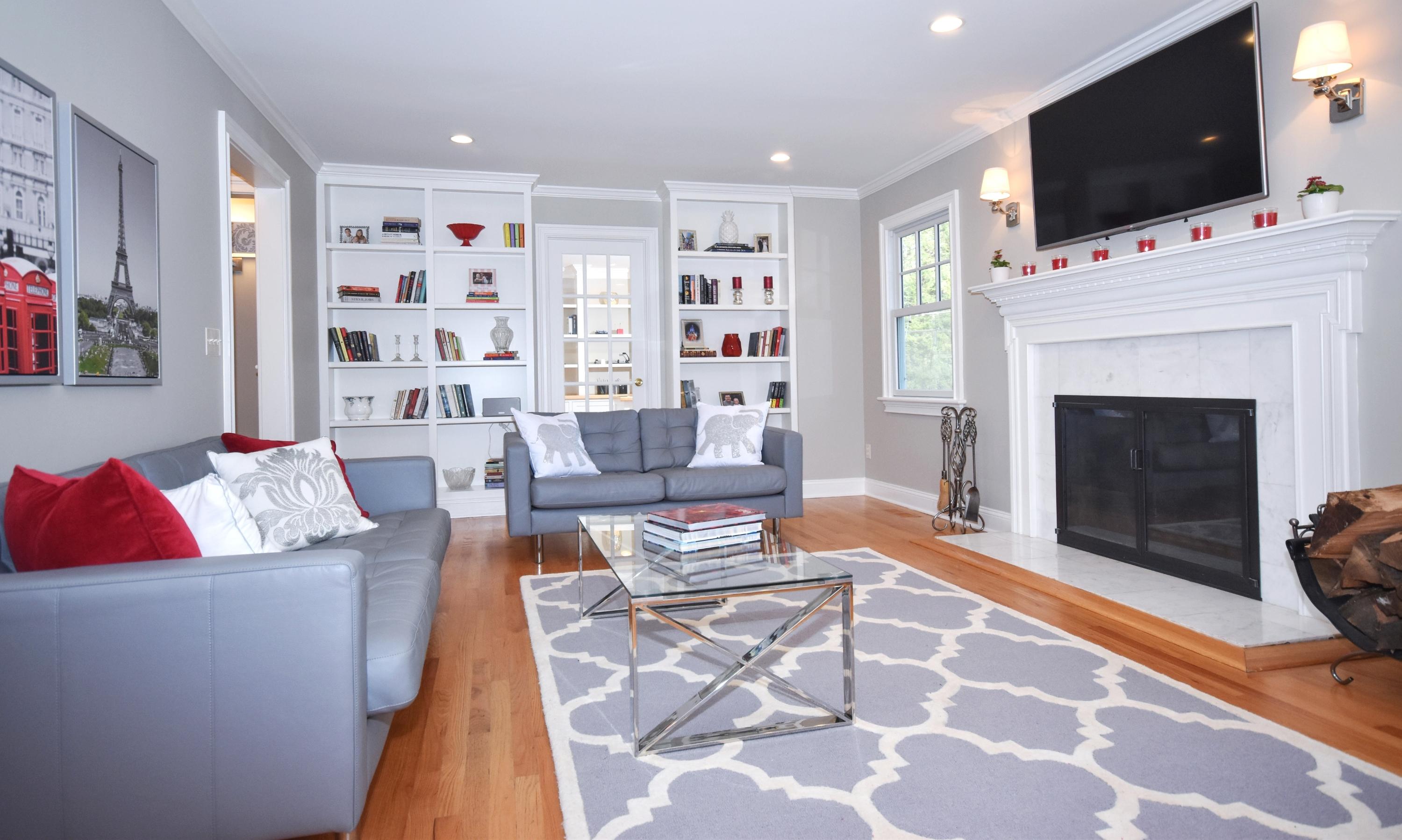 10 Barringer Road Darien, CT 06820 - Photo 13 of 27 a living room with furniture and a flat screen tv