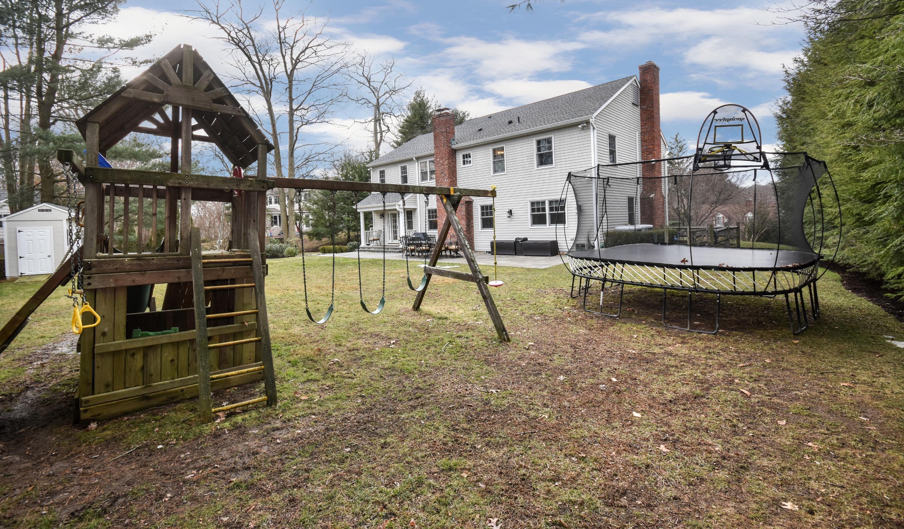 10 Barringer Road Darien, CT 06820 - Photo 25 of 27 a view of a house with backyard