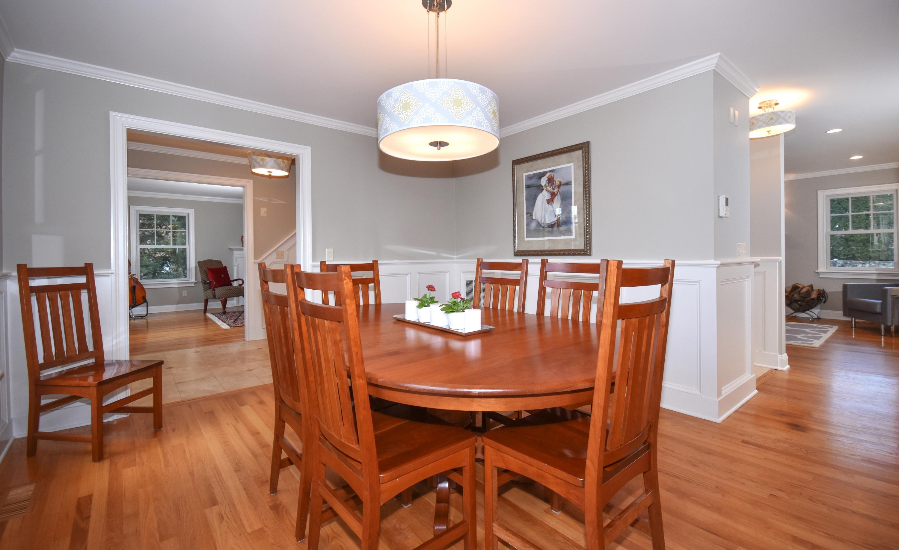10 Barringer Road Darien, CT 06820 - Photo 6 of 27 a dining room with furniture and wooden floor