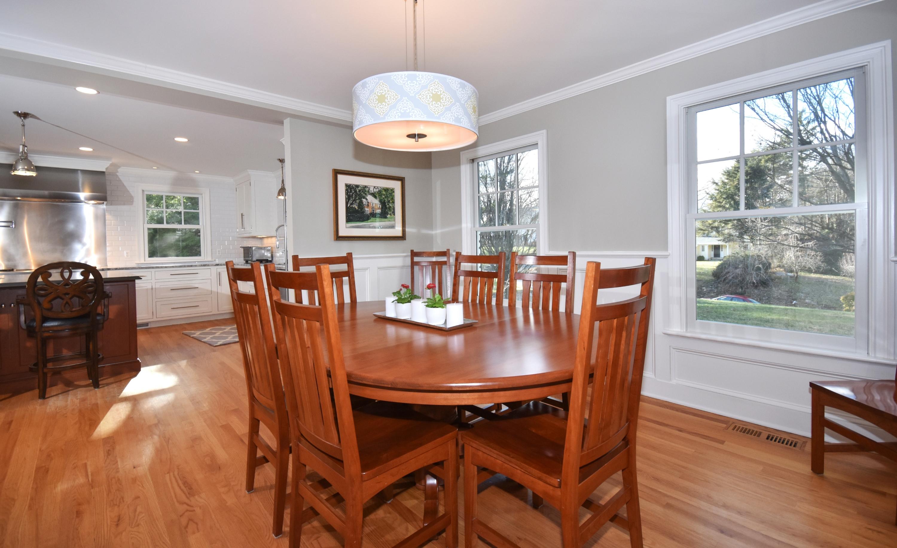 10 Barringer Road Darien, CT 06820 - Photo 7 of 27 a view of a dining room with furniture window and wooden floor
