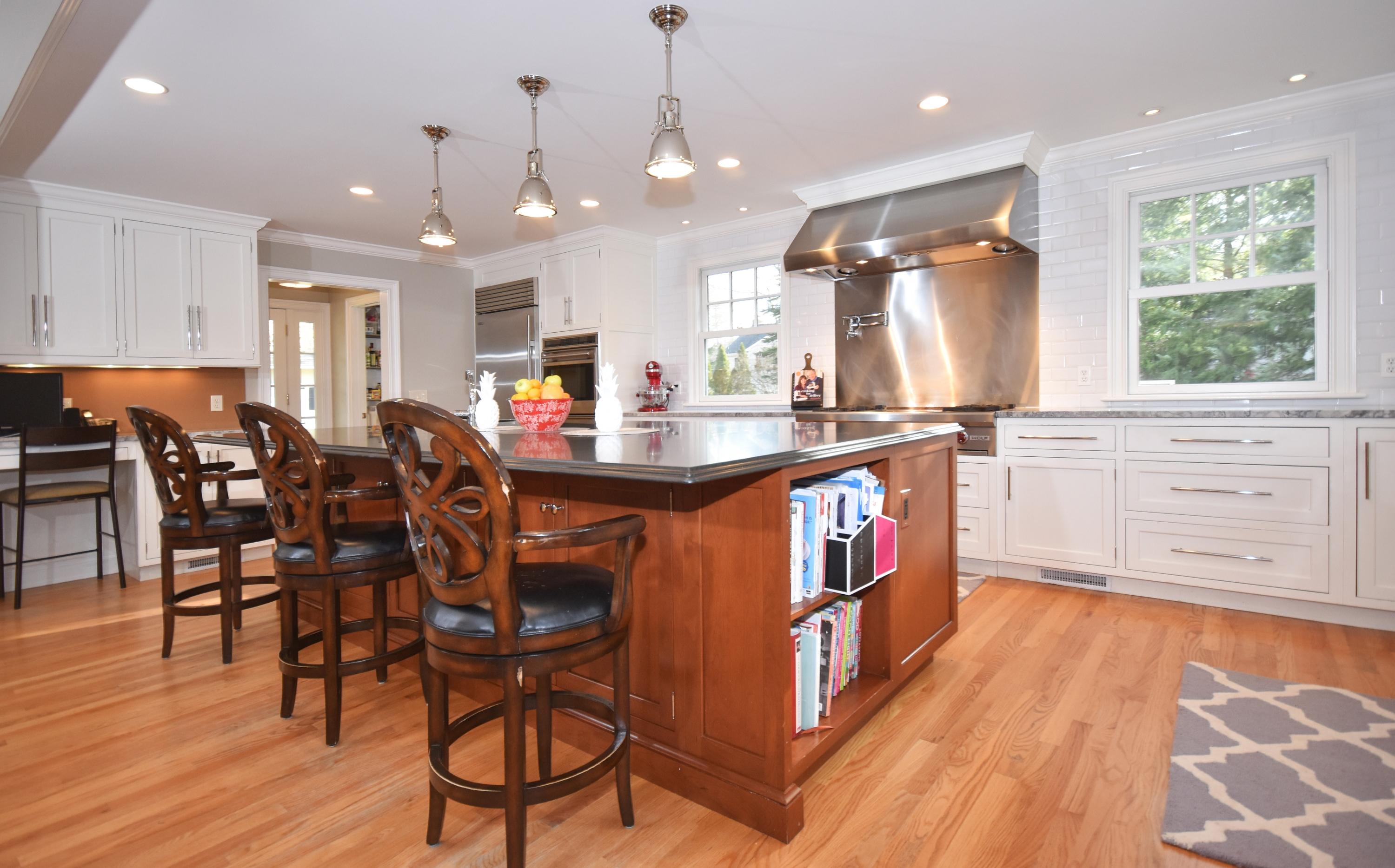 10 Barringer Road Darien, CT 06820 - Photo 9 of 27 a kitchen with stainless steel appliances granite countertop a stove a sink and a refrigerator