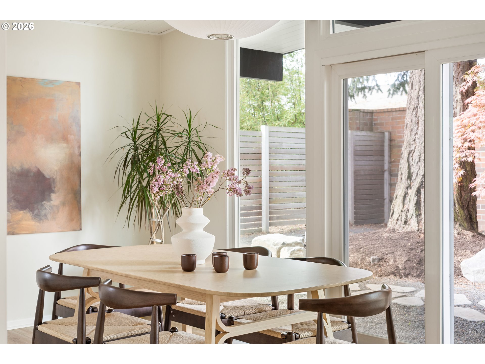 7125 Southwest 105th Avenue Beaverton, OR 97008 - Photo 21 of 39 a view of a dining room with furniture and window