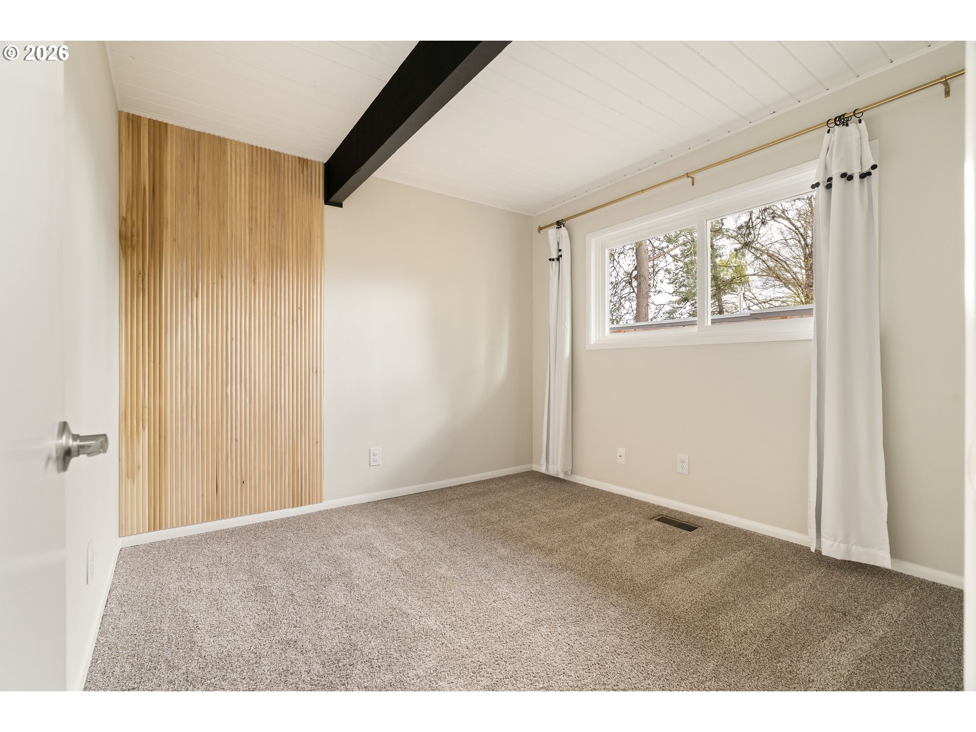 7125 Southwest 105th Avenue Beaverton, OR 97008 - Photo 30 of 39 a view of an empty room with a window