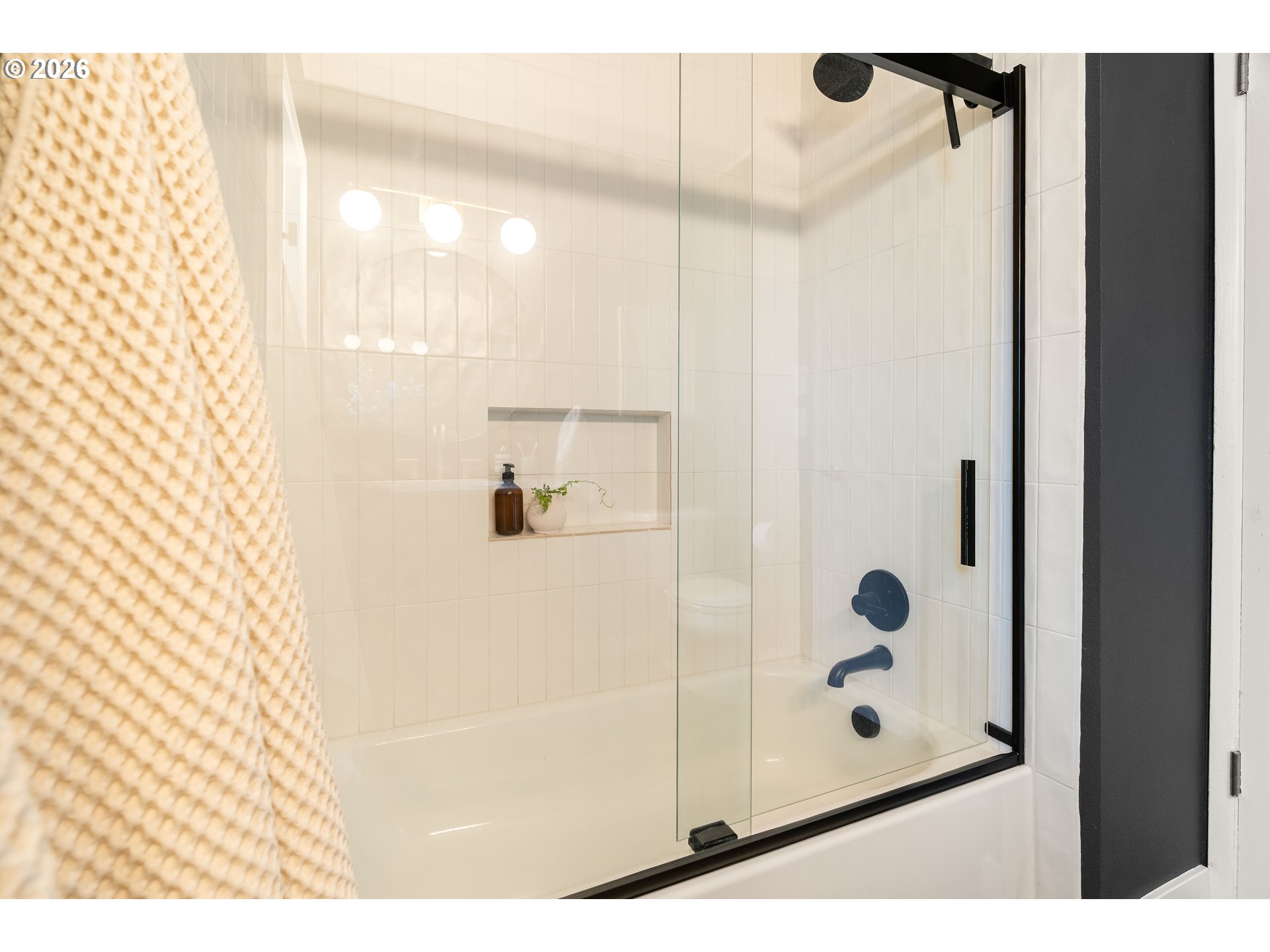 7125 Southwest 105th Avenue Beaverton, OR 97008 - Photo 33 of 39 a bathroom with a shower and a sink