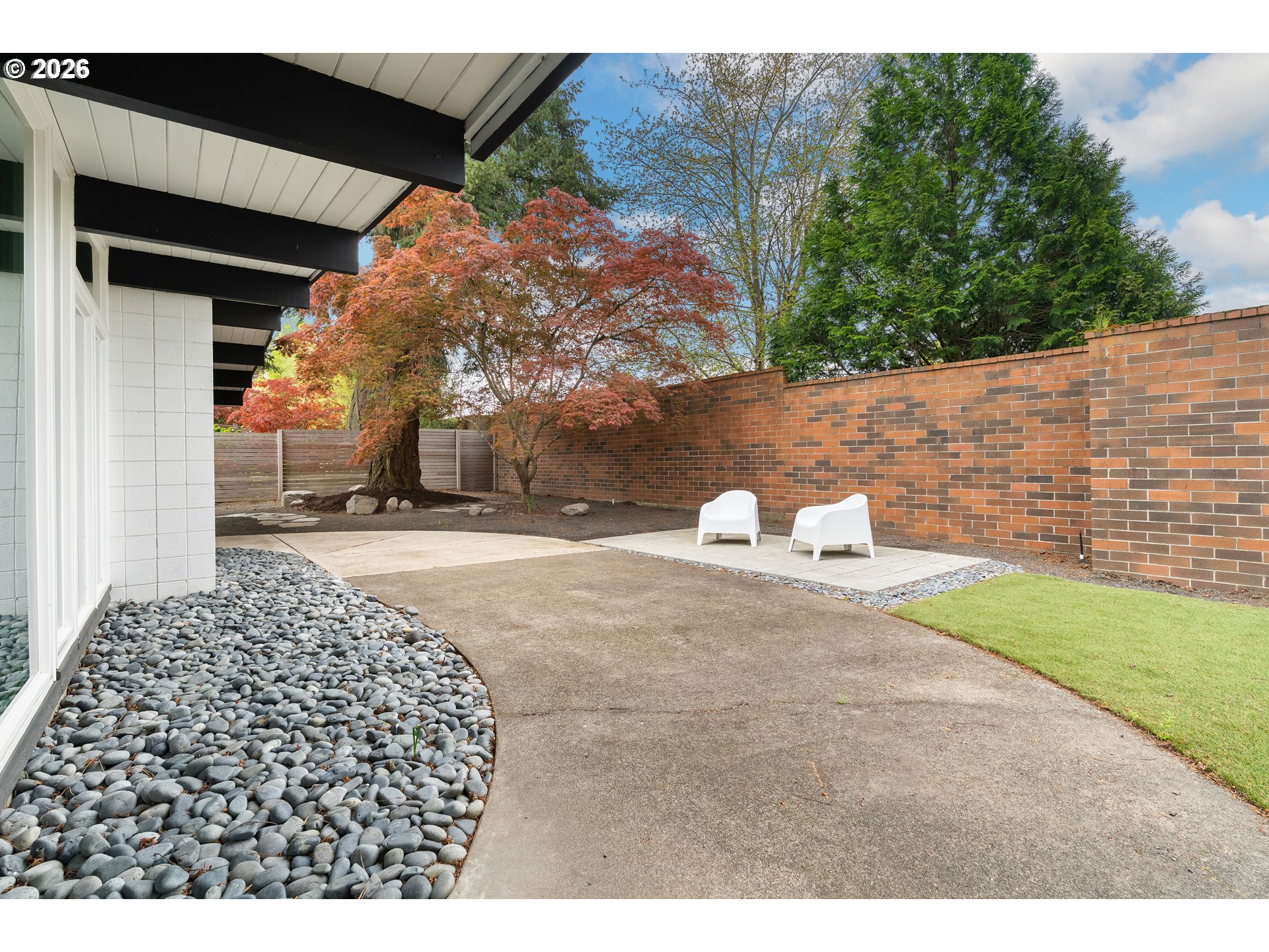7125 Southwest 105th Avenue Beaverton, OR 97008 - Photo 37 of 39 a view of a backyard of the house