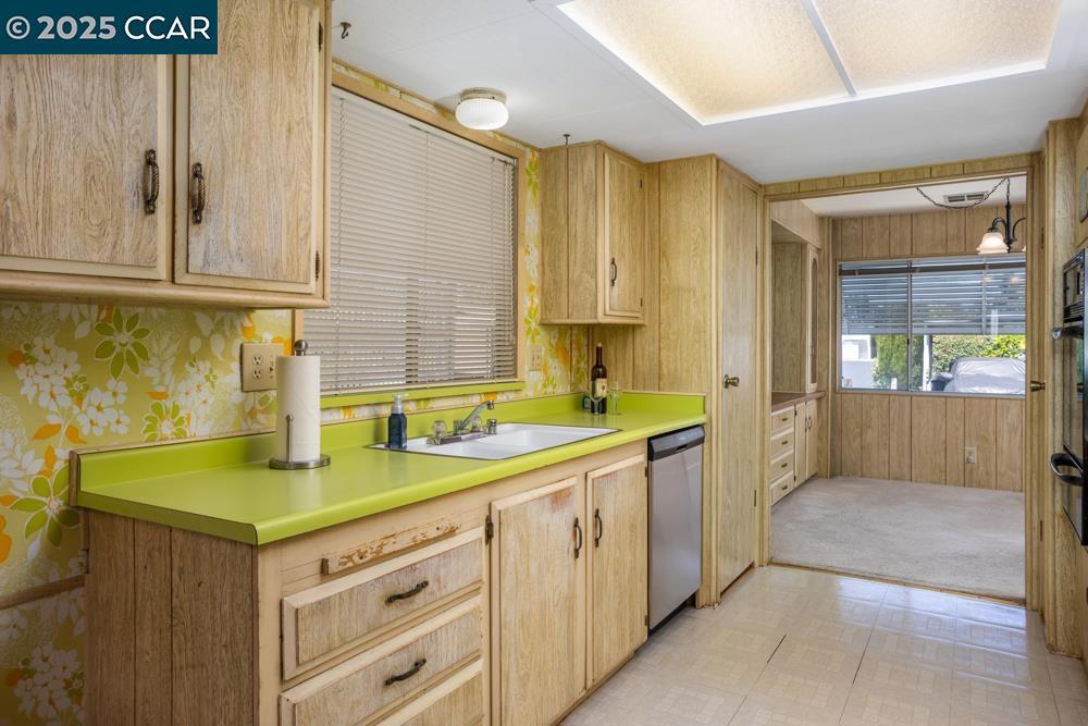 2110 Dalis Drive Concord, CA 94520 - Photo 12 of 30 a kitchen with a sink and cabinets
