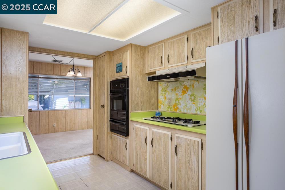 2110 Dalis Drive Concord, CA 94520 - Photo 13 of 30 a kitchen with stainless steel appliances a refrigerator and a cabinets