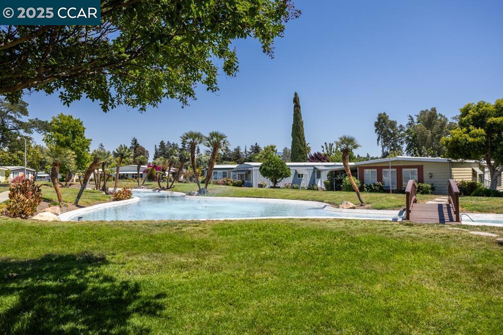 2110 Dalis Drive Concord, CA 94520 - Photo 24 of 30 a view of house with garden and trees