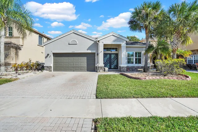 $550,000 | 10105 Clubhouse Turn Road, Lake Worth, FL 33449