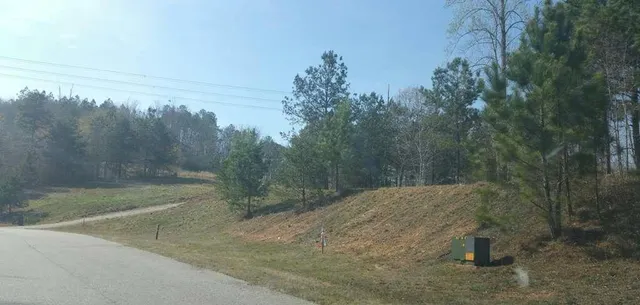 a view of a backyard of the house