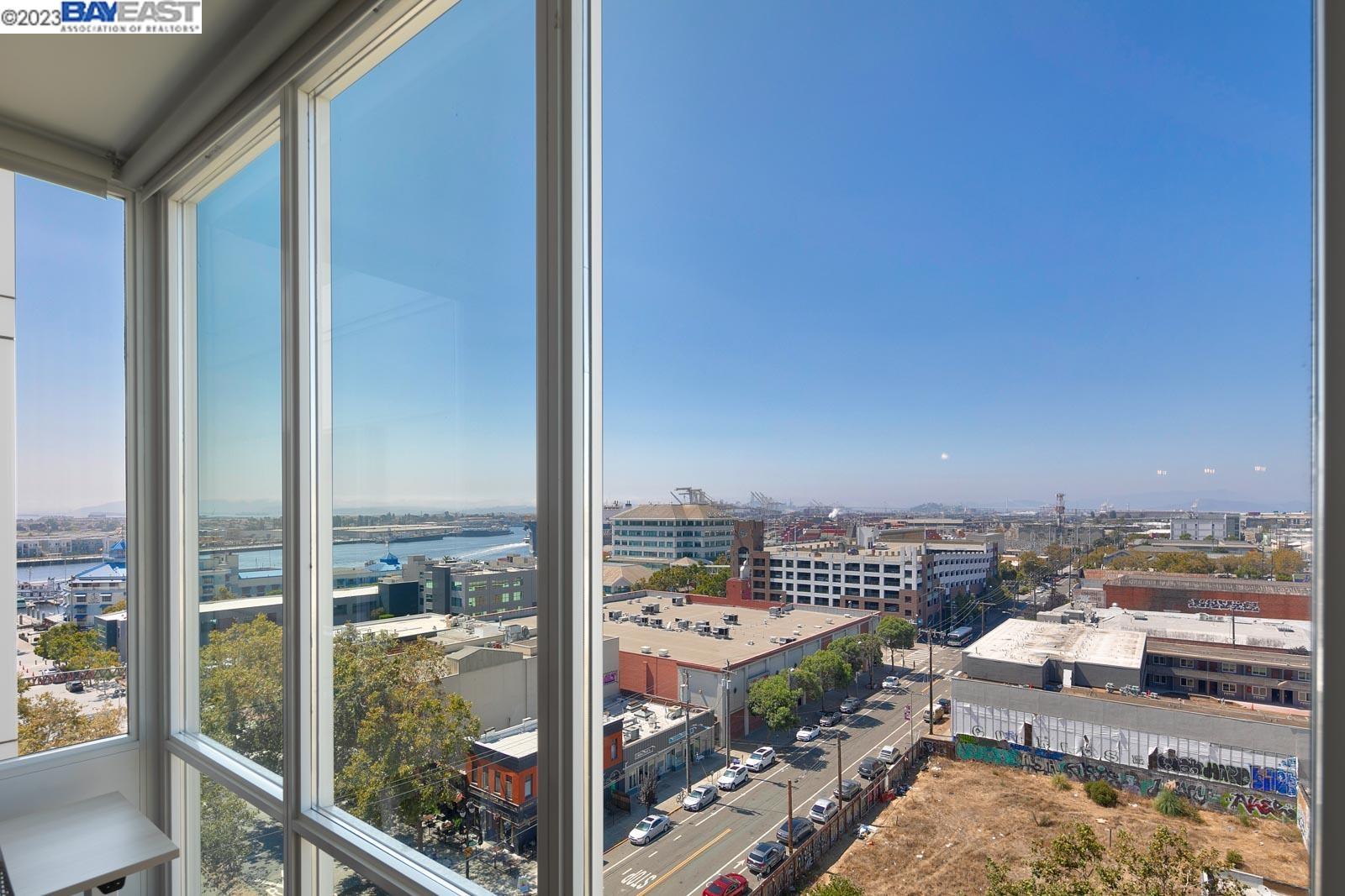 222 Broadway, Unit 1004 Oakland, CA 94607 - Photo 15 of 60 a city view with tall buildings