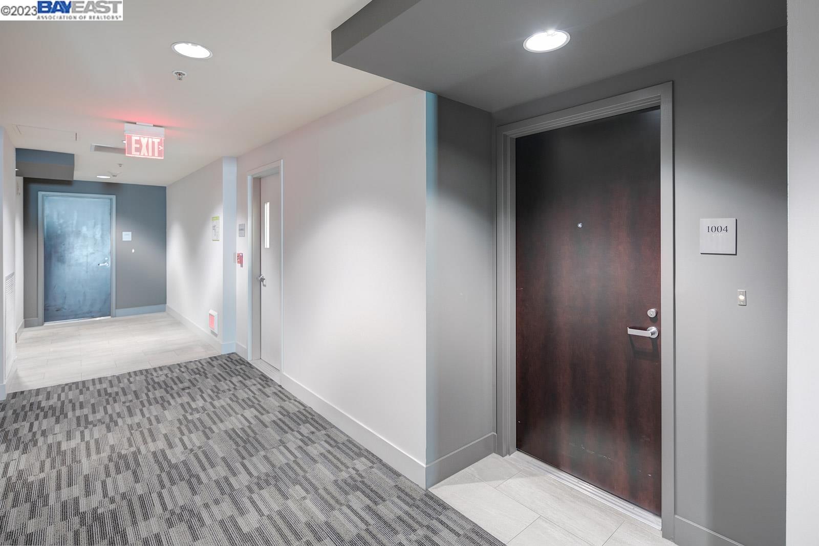 222 Broadway, Unit 1004 Oakland, CA 94607 - Photo 46 of 60 a view of a hallway with wooden floor