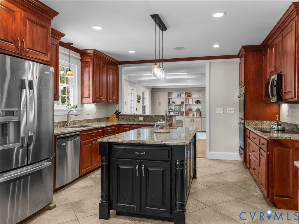 13099 Cedon Road Ashland, VA 23005 - Photo 16 of 92 Chef's kitchen featuring rich wood cabinetry, stai