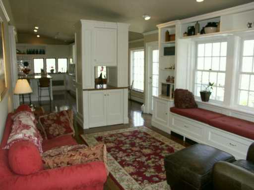 Undisclosed Address Cos Cob, CT 06807 - Photo 3 of 8 a living room with a couch and next to a window