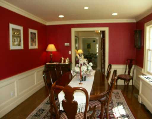 Undisclosed Address Cos Cob, CT 06807 - Photo 4 of 8 a view of a dining room with furniture and chandelier