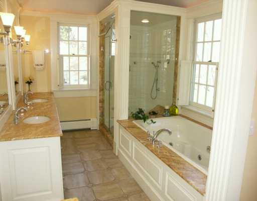 Undisclosed Address Cos Cob, CT 06807 - Photo 7 of 8 a bathroom with a granite countertop tub sink and mirror