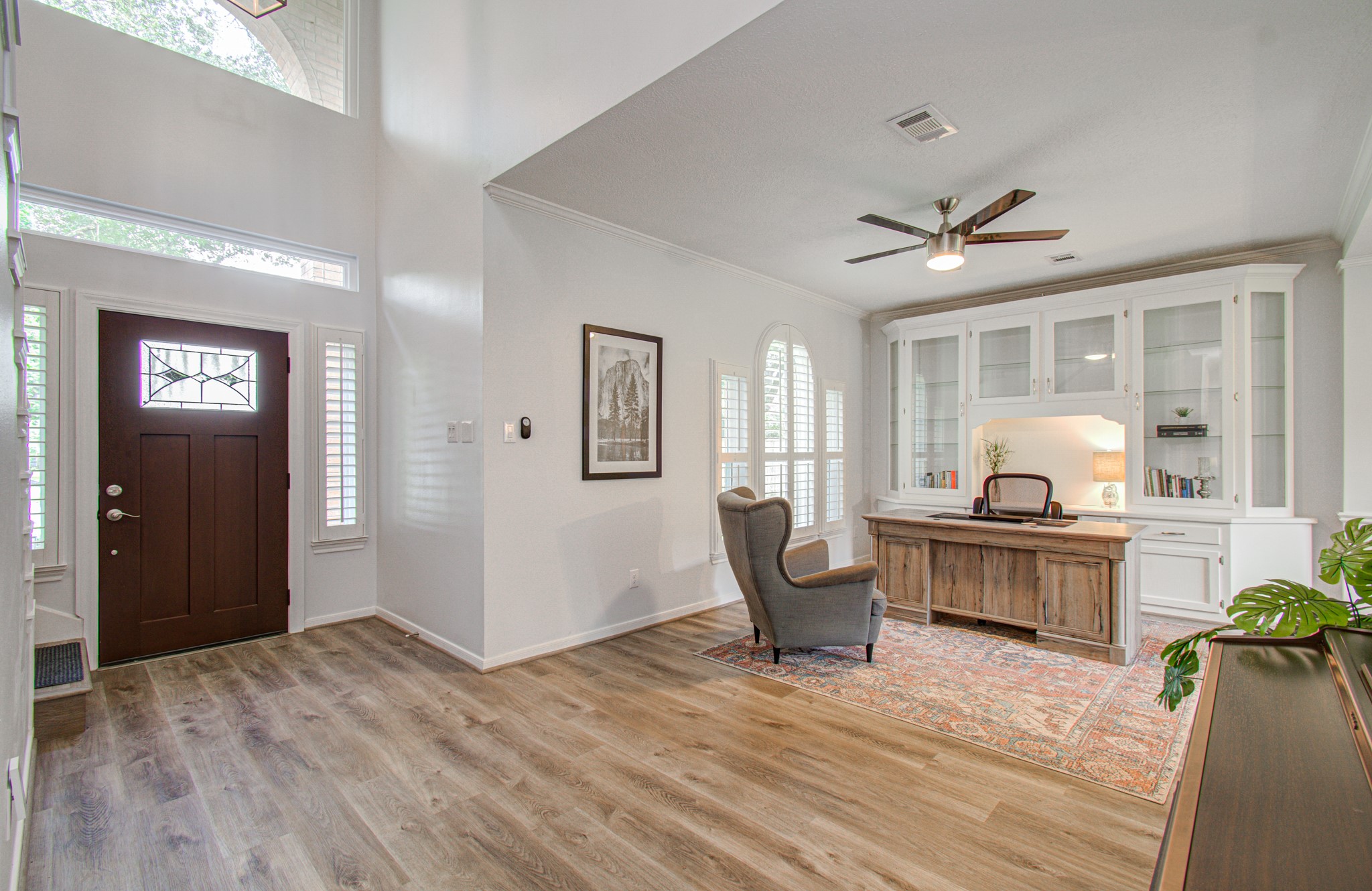 22927 Northoak Forest Lane Spring, TX 77389 - Photo 3 of 37 a living room with furniture and a wooden floor