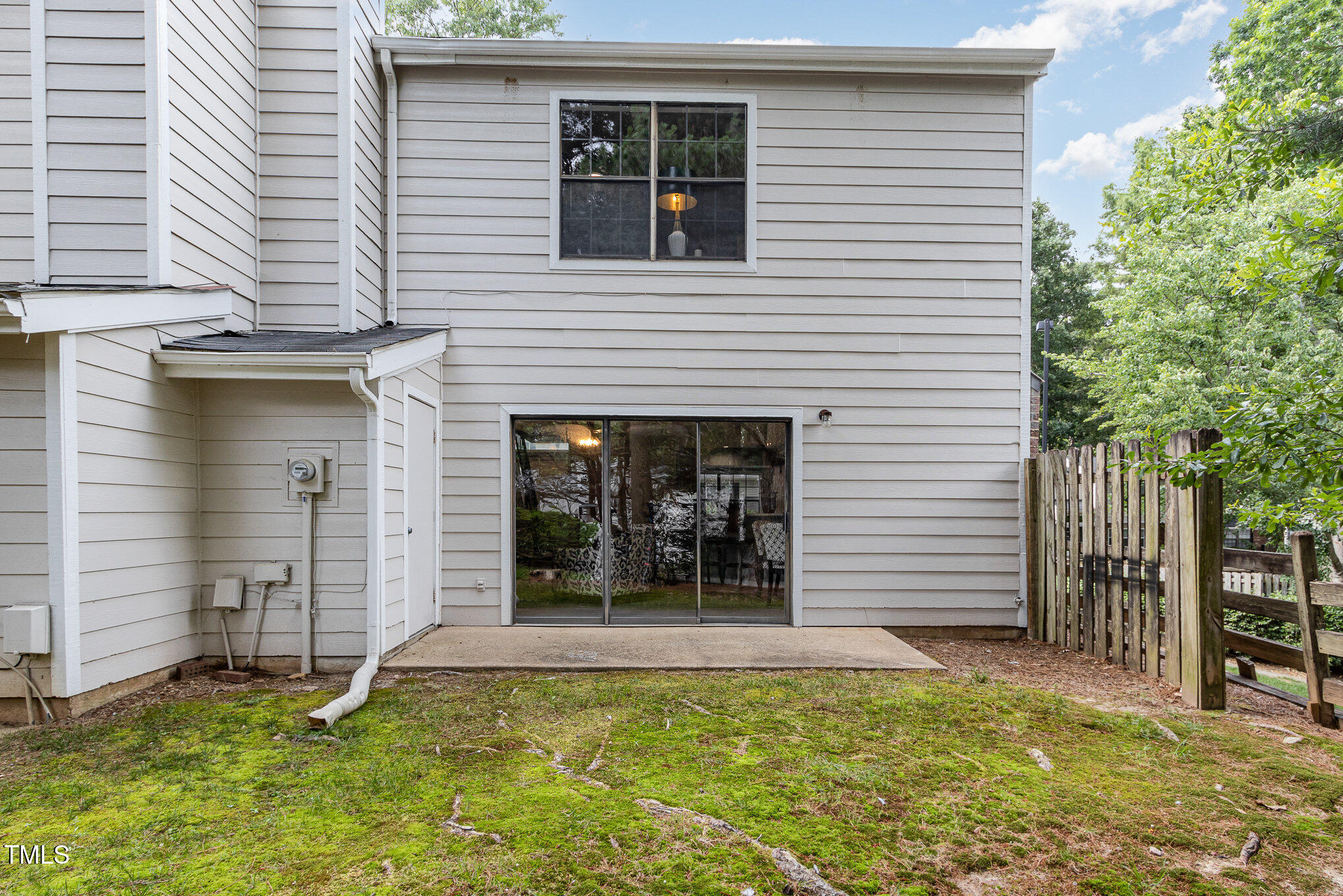 7708 Falcon Rest Circle Raleigh, NC 27615 - Photo 19 of 23 Patio, sized for a grill or fire feature and seating arrangement, locking outdoor storage.