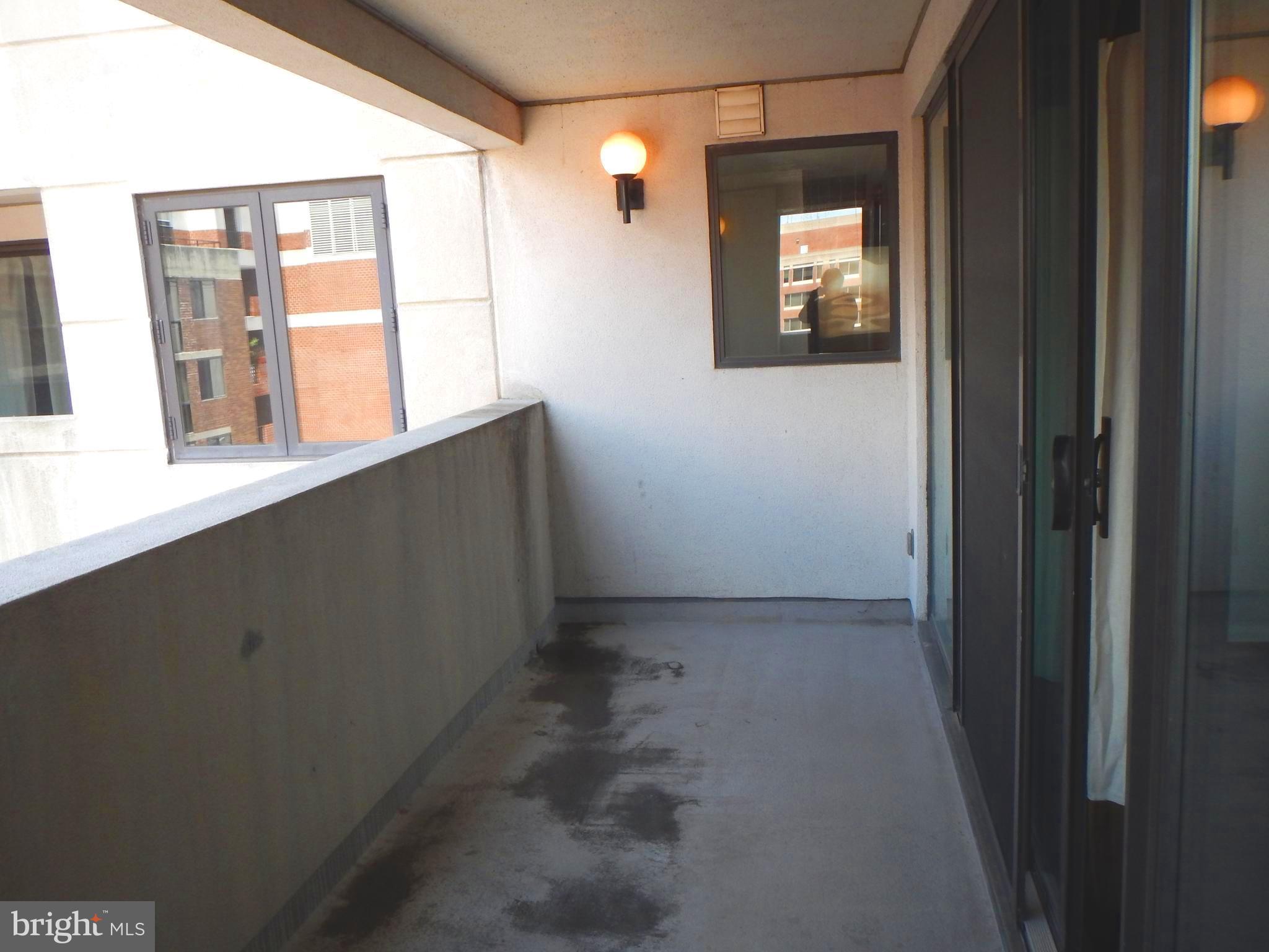 2311 M Street Northwest, Unit 802 Washington, DC 20037 - Photo 17 of 25 Large balcony off living room