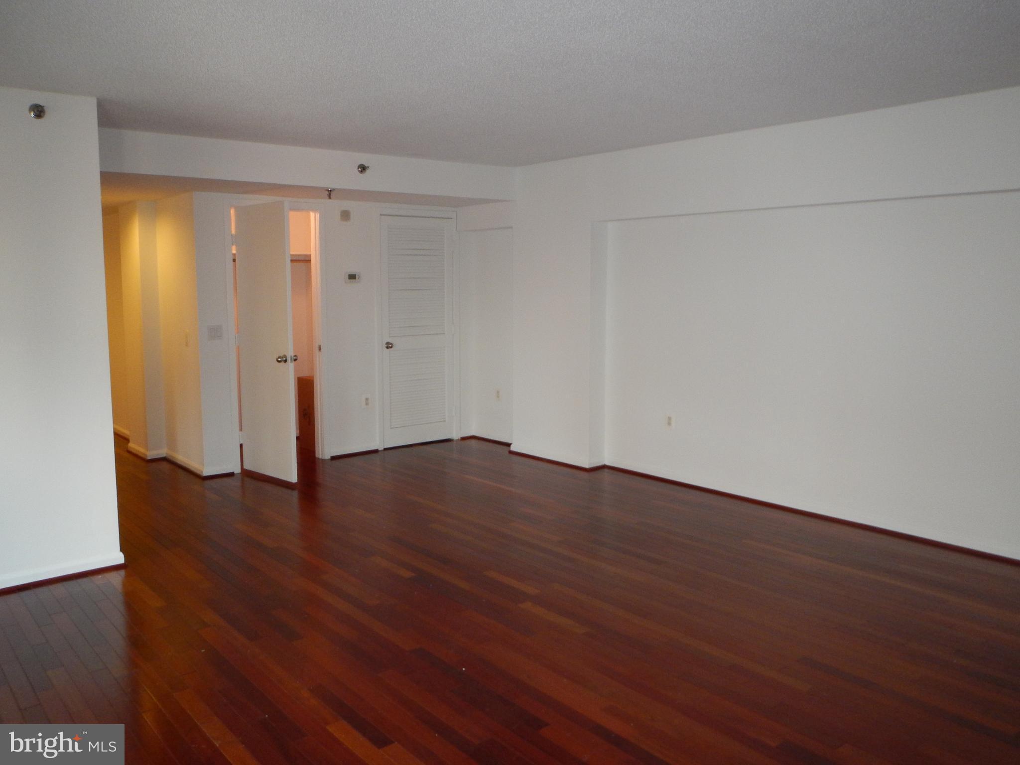2311 M Street Northwest, Unit 802 Washington, DC 20037 - Photo 7 of 25 Living Room