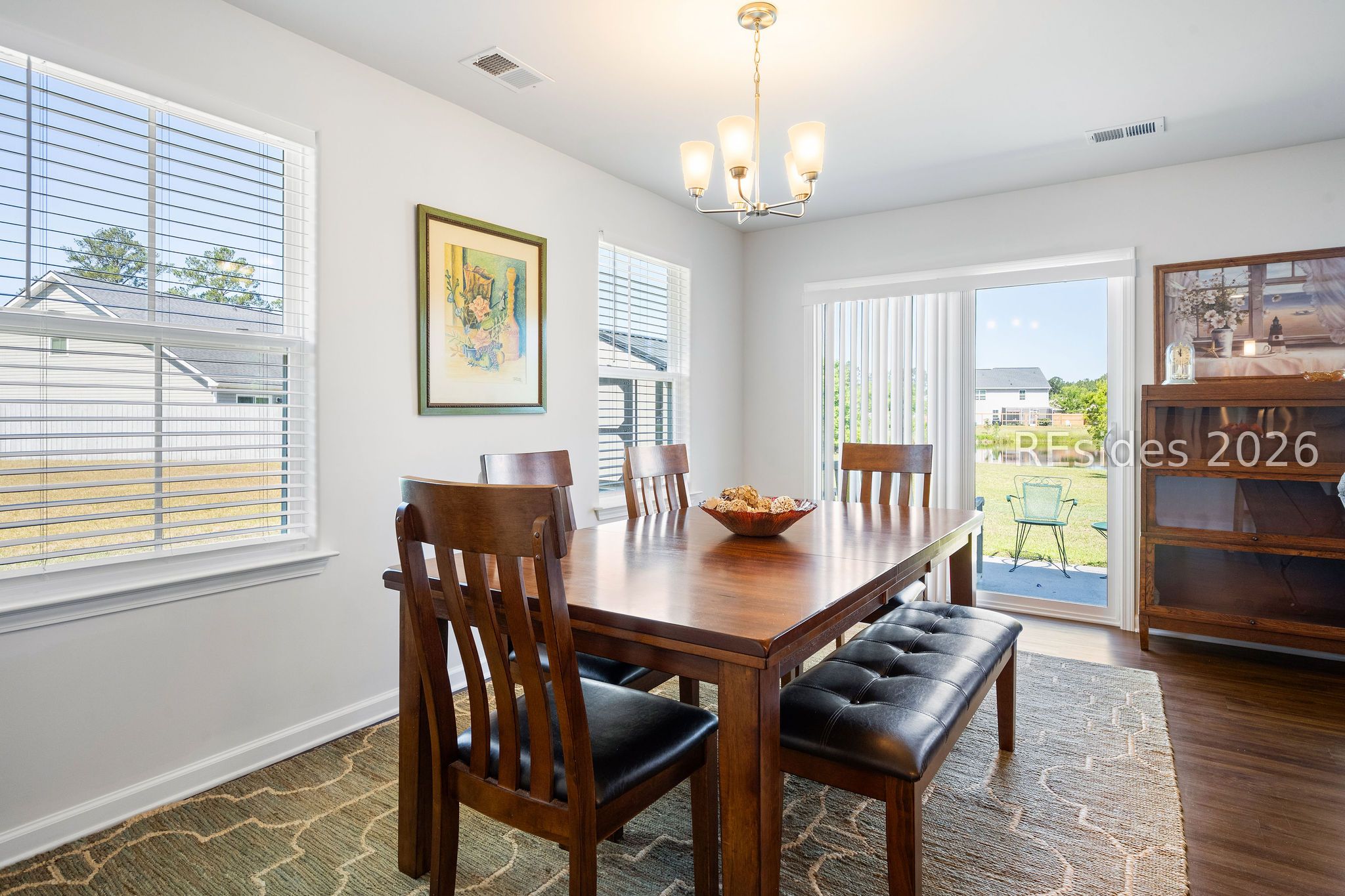 664 Ridgeland Lakes Drive Ridgeland, SC 29936 - Photo 11 of 39 Dining Area Out to Patio with Lagoon View