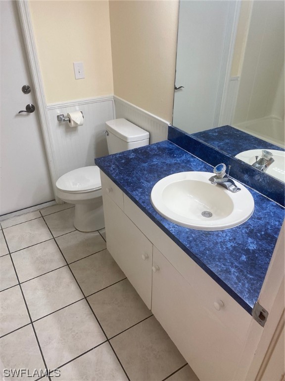 18620 Sebring Road Fort Myers, FL 33967 - Photo 11 of 32 a bathroom with a granite countertop sink and a mirror