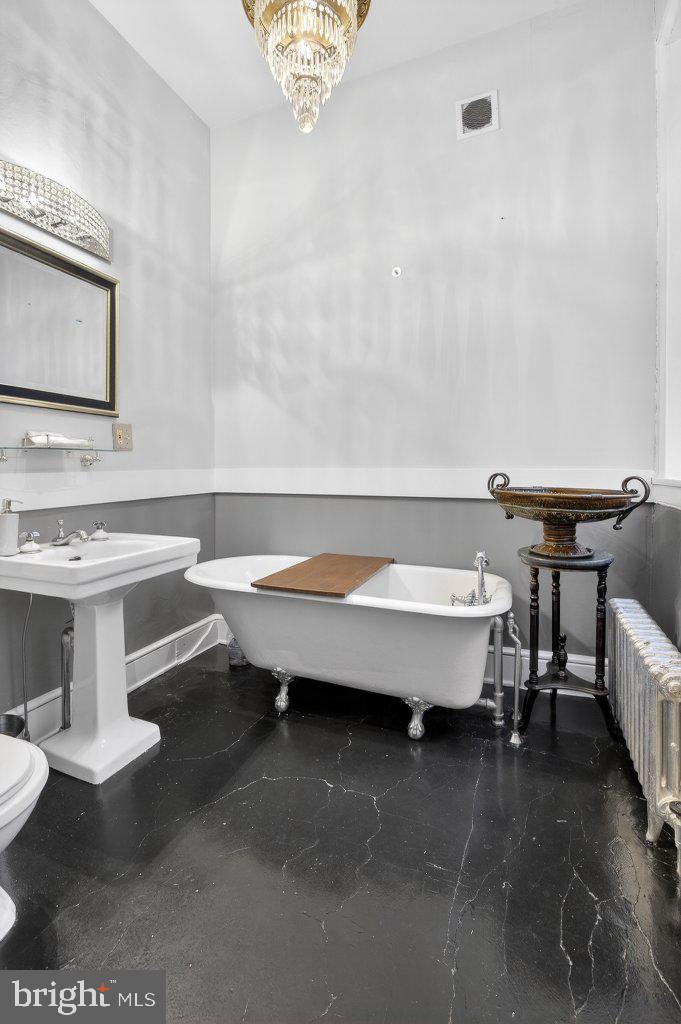 22 South 2nd Street Columbia, PA 17512 - Photo 11 of 40 a bathroom with a bathtub and a sink
