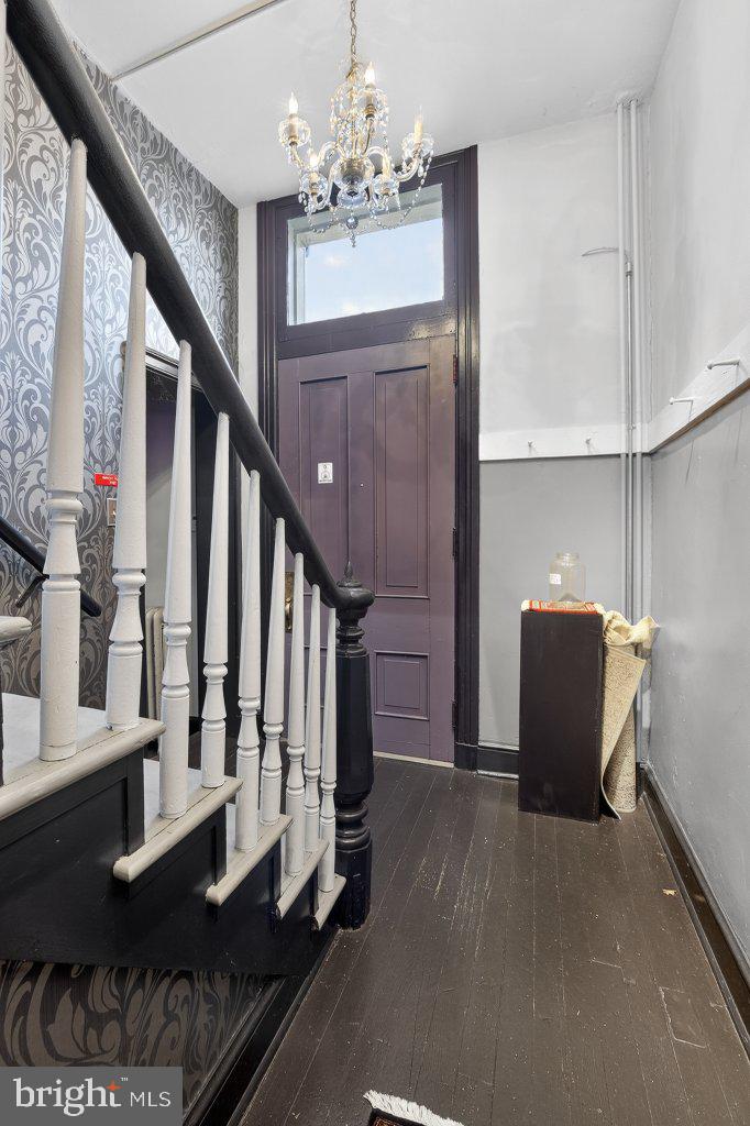 22 South 2nd Street Columbia, PA 17512 - Photo 13 of 40 a view of a living room with furniture and a chandelier