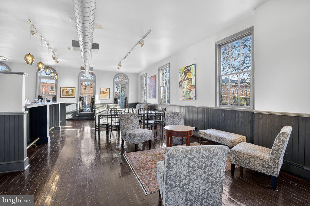 22 South 2nd Street Columbia, PA 17512 - Photo 19 of 40 a living room with furniture wooden floor and a flat screen tv