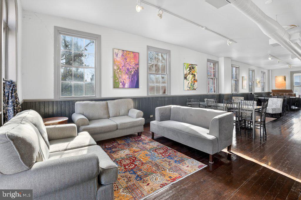 22 South 2nd Street Columbia, PA 17512 - Photo 21 of 40 a living room with furniture wooden floor and windows