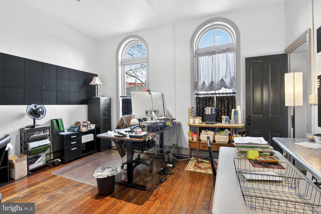 22 South 2nd Street Columbia, PA 17512 - Photo 26 of 40 a living room with furniture a fireplace and a table