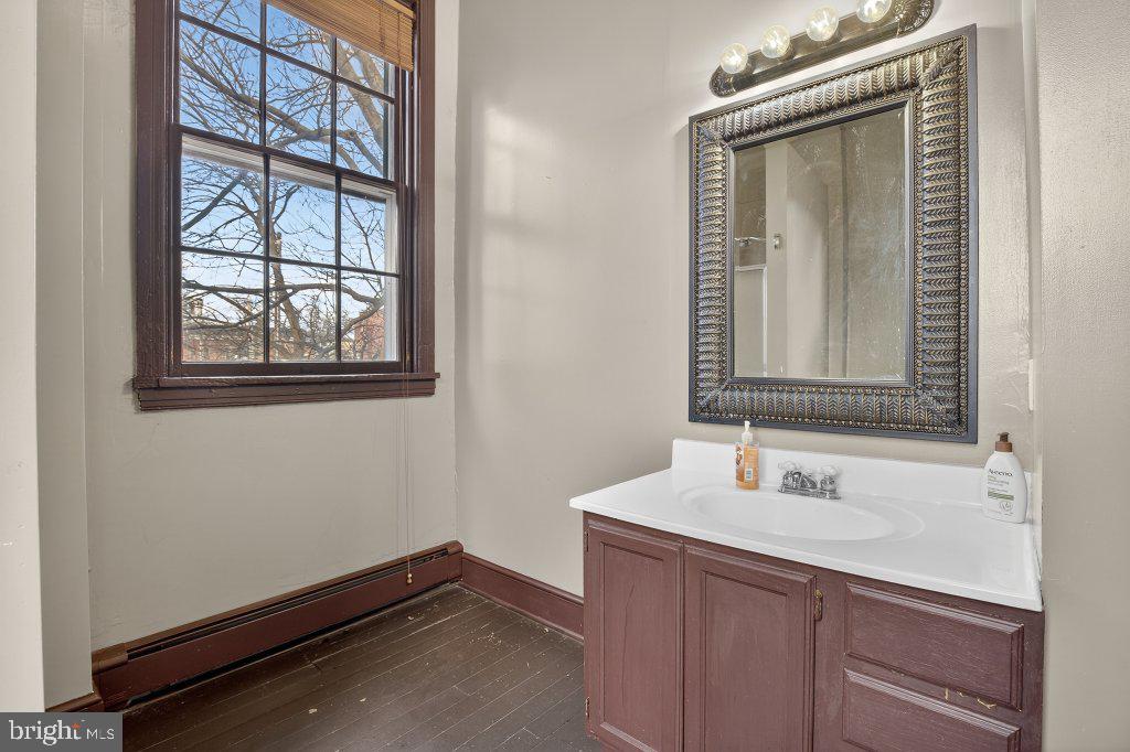 22 South 2nd Street Columbia, PA 17512 - Photo 28 of 40 a bathroom with a sink and a mirror