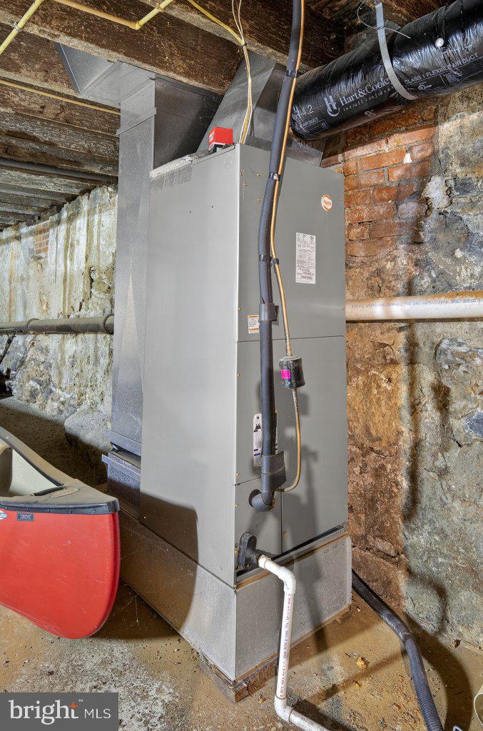 22 South 2nd Street Columbia, PA 17512 - Photo 33 of 40 a bathroom with a granite countertop sink and a mirror
