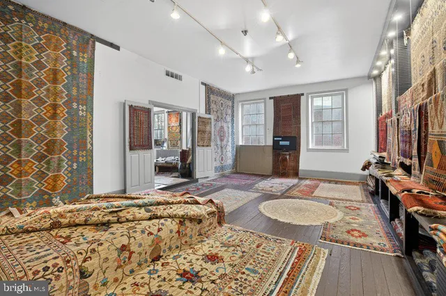 a bathroom with a bathtub and a sink