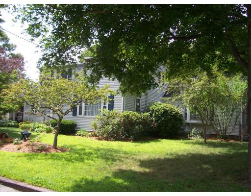 7 Washington Terrace Woburn, MA 01801 - Photo 3 of 16 a house view with a garden space