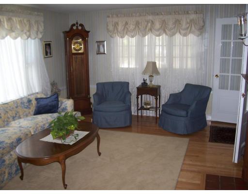 7 Washington Terrace Woburn, MA 01801 - Photo 9 of 16 a living room with furniture and a window