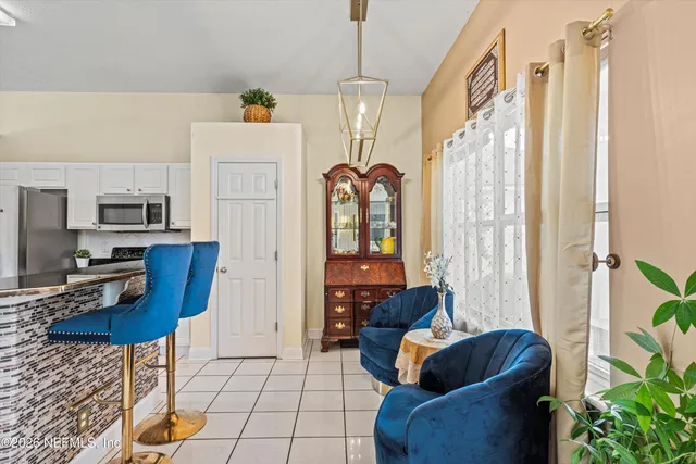 a bathroom with a toilet a sink and a mirror