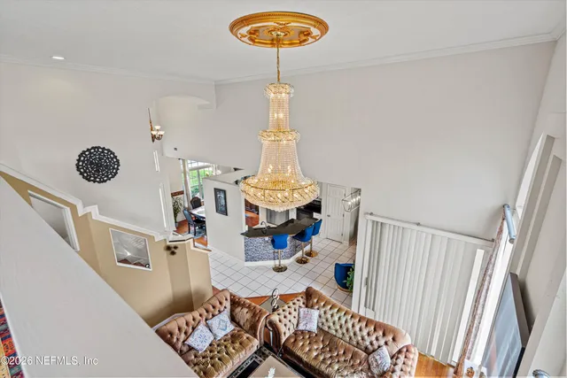 a view of backyard with a garden and entertaining space