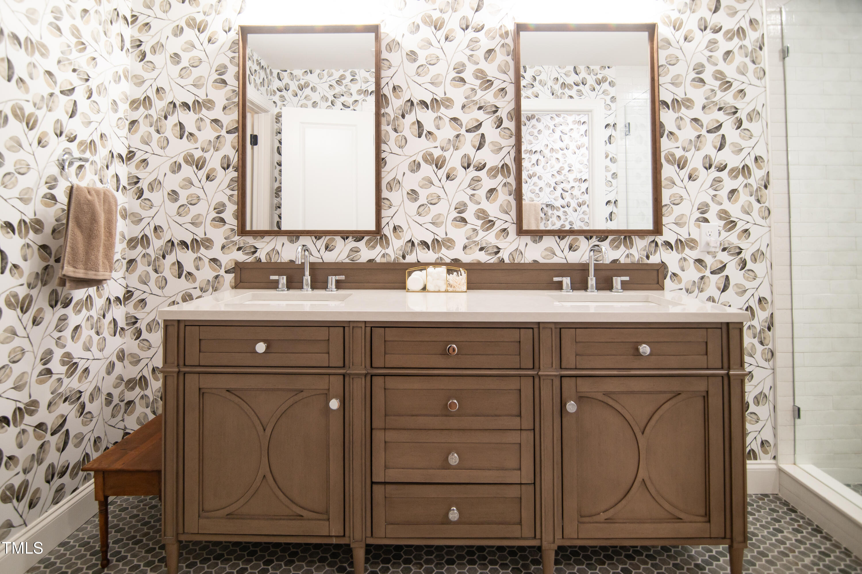 5012 Skidmore Street Raleigh, NC 27609 - Photo 14 of 27 a bathroom with a sink vanity and mirror