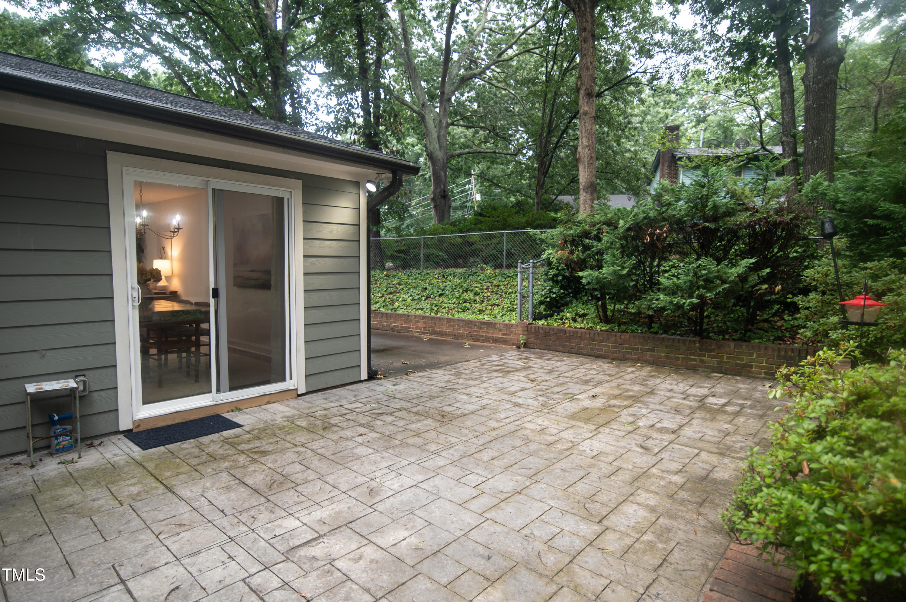 5012 Skidmore Street Raleigh, NC 27609 - Photo 22 of 27 a view of a backyard with pathway