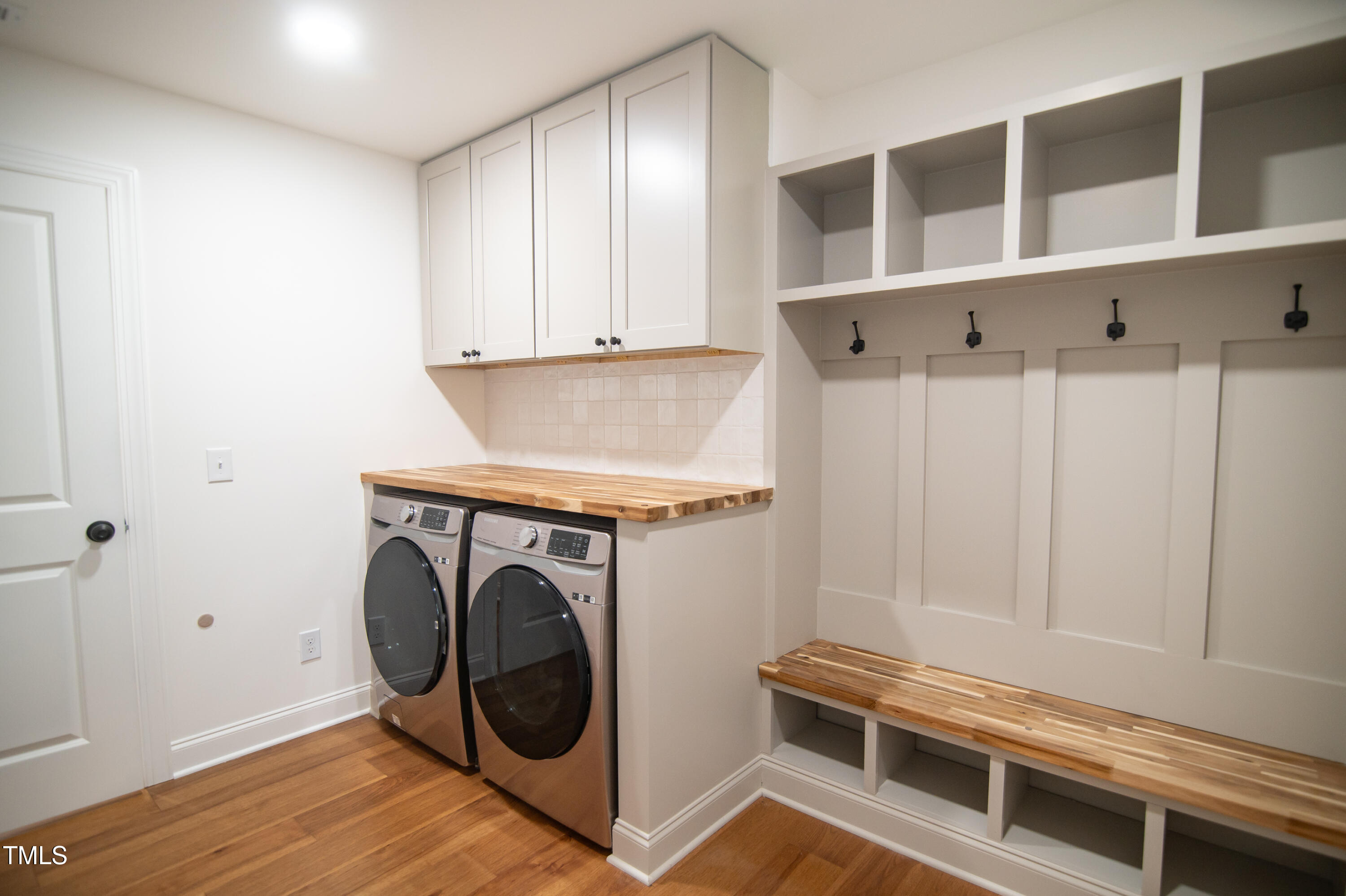5012 Skidmore Street Raleigh, NC 27609 - Photo 24 of 27 a utility room with dryer and washer