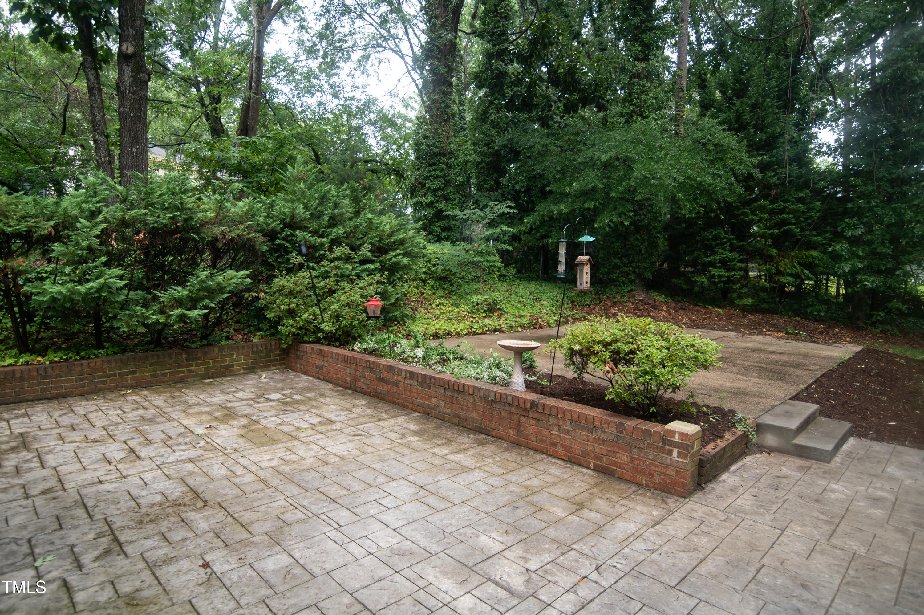 5012 Skidmore Street Raleigh, NC 27609 - Photo 25 of 27 a view of a garden with chair