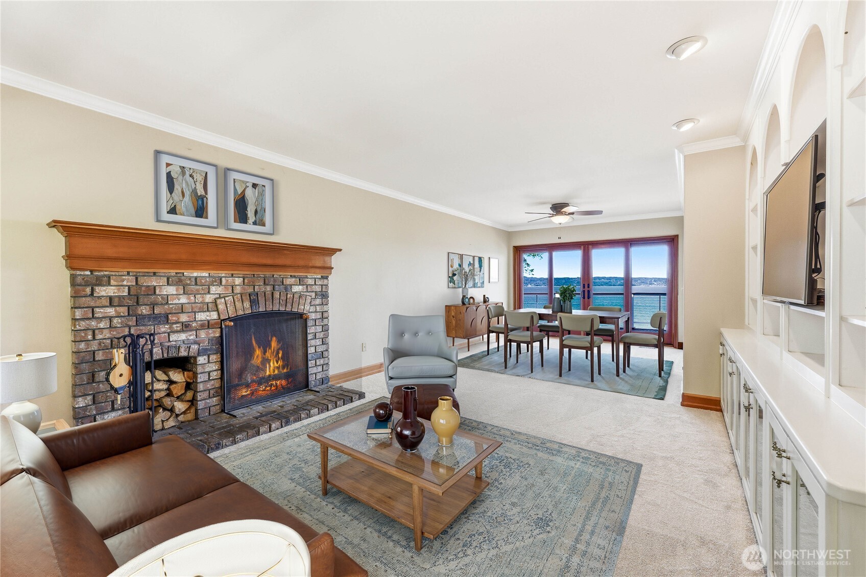 252 Jansen Road Nordland, WA 98358 - Photo 5 of 40 a living room with furniture fireplace and a table