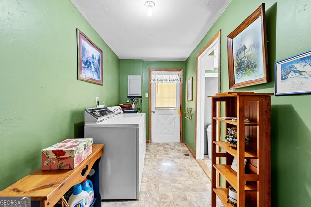 a bathroom with a sink toilet and a shower