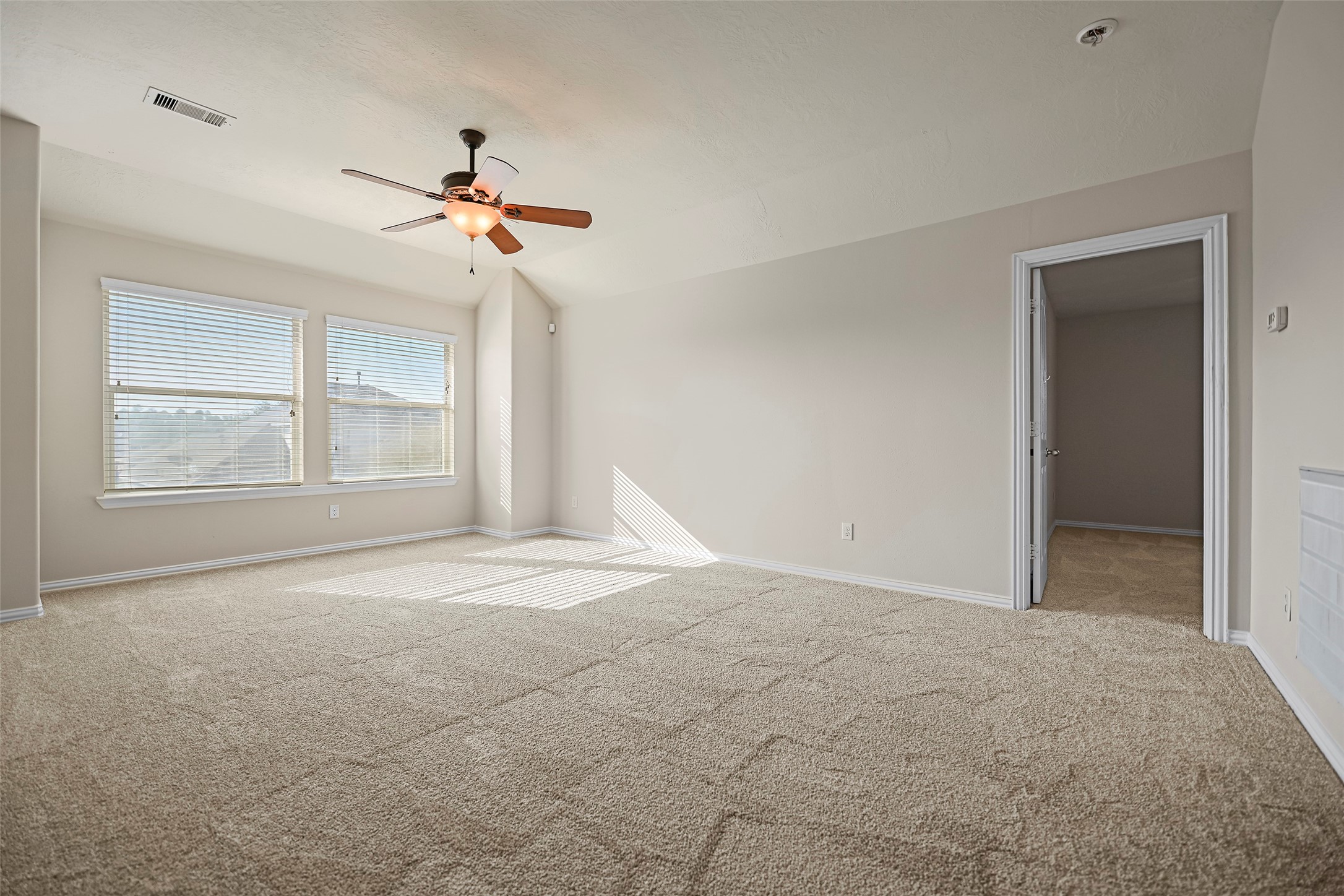 8323 Rudy Brook Way Spring, TX 77379 - Photo 23 of 35 a view of empty room with windows