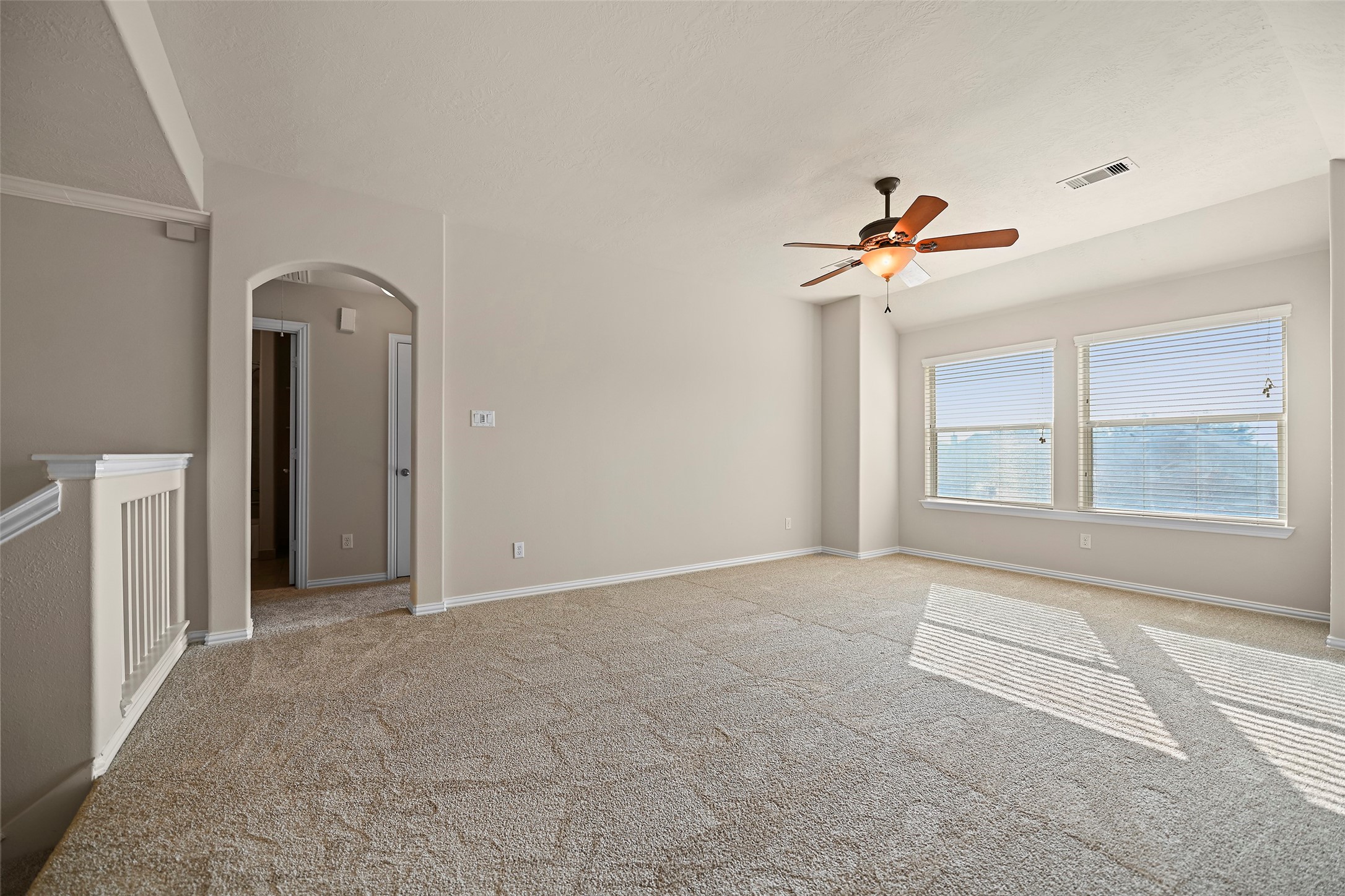 8323 Rudy Brook Way Spring, TX 77379 - Photo 24 of 35 a view of an empty room with a window